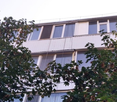Крепление обшивочного листа на фасаде МКД (Ленина 57)